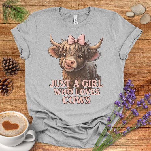 Highland Cow T-Shirt – “Just a Girl Who Loves Cows” Cute Farmhouse Tee with Pink Bow Design
