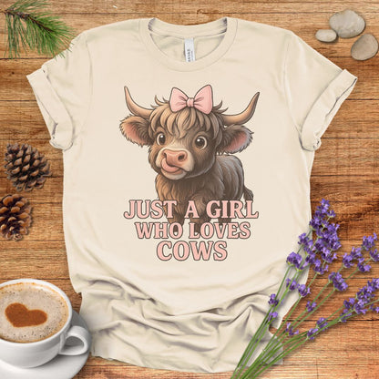 Highland Cow T-Shirt – “Just a Girl Who Loves Cows” Cute Farmhouse Tee with Pink Bow Design