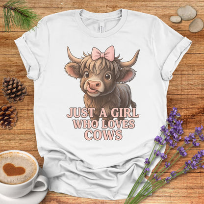Highland Cow T-Shirt – “Just a Girl Who Loves Cows” Cute Farmhouse Tee with Pink Bow Design